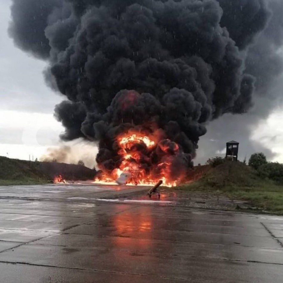 Tu-22m3 burning after a saboteur with a small drone dropped a grenade.jpg